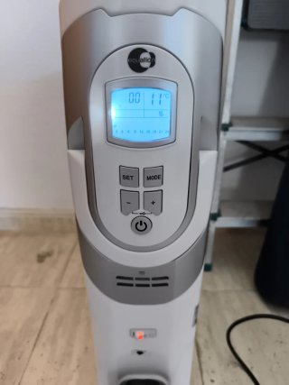 Radiador de aceite blanco y gris