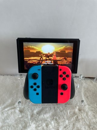 Nintendo Switch + mando oficial + 2 juegos