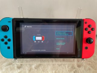Nintendo Switch + mando oficial + 2 juegos