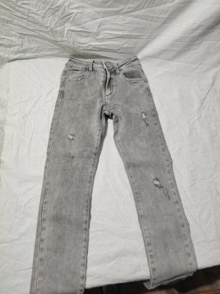 Jeans grigi strappati