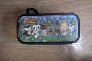 Nintendo Switch Lite + Scatola + Giochi + Custodia