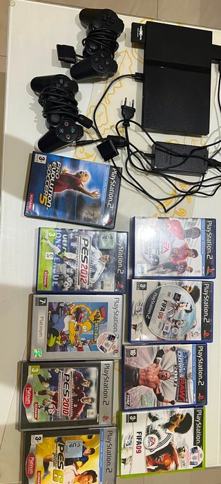 Playstation 2 Negra Sony más 9 juegos más 2 mandos