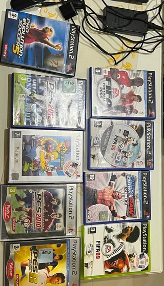 Playstation 2 Negra Sony más 9 juegos más 2 mandos