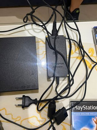 Playstation 2 Negra Sony más 9 juegos más 2 mandos