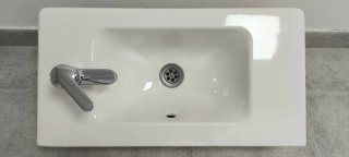 Lavabo Roca porcelana con grifo y válvula