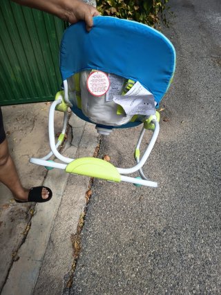 Mecedora para bebé con arco de juegos
