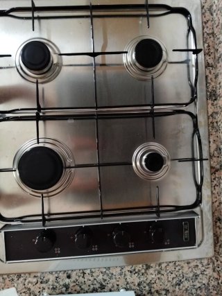 Cocina Teka cuatro fogones por estrenar accesorios