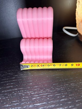 Soporte móvil rosa minimalista