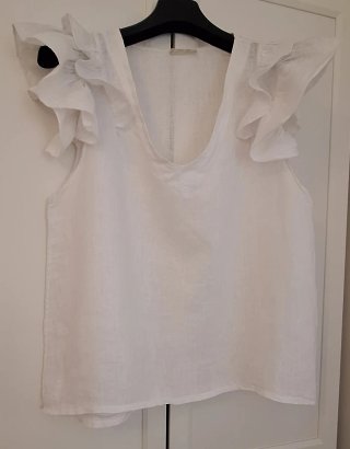 Blusa blanca con volantes 100% lino