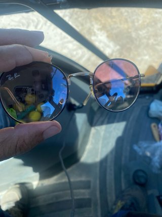 Gafas de sol Ray-Ban doradas y marrones