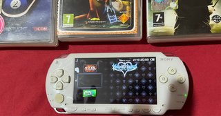 Playstation Portable Bianca + 5 Giochi