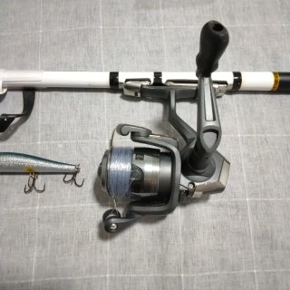 Caña pesca + carrete + señuelo