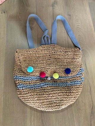 Mochila Zara pompones y conchas