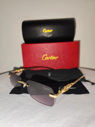 Gafas de sol Cartier doradas y negras