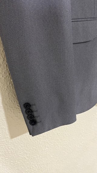 Traje chaqueta y pantalón gris