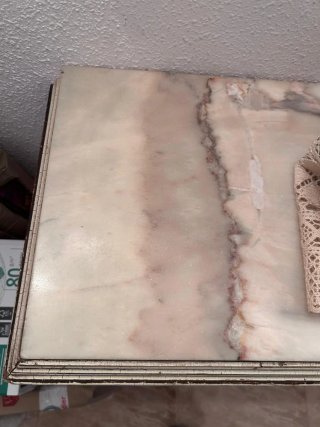 Mesa de entrada con querubines