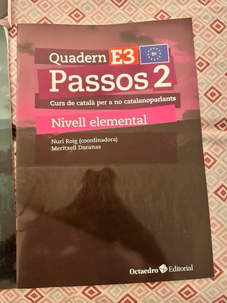 Llibre de classes nivell elemental i quaderns.