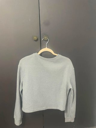 Jersey gris de manga larga