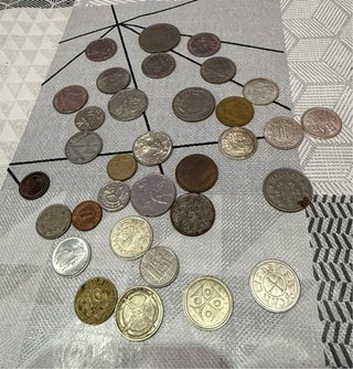 Monedas y billetes antiguas de pesetas y varias