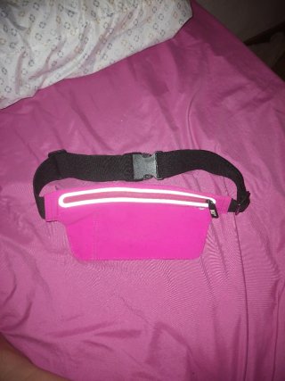 Riñonera deportiva rosa con banda reflectante