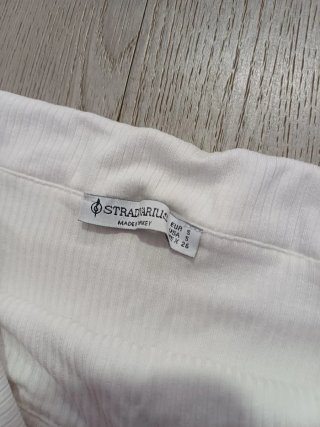 Top Stradivarius blanco