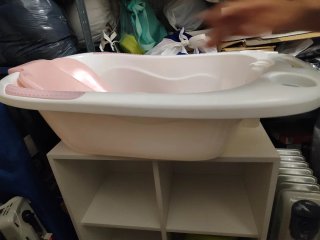 Bañera bebé con soporte rosa y blanco