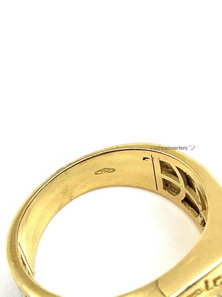 sello oro 18k con circonita