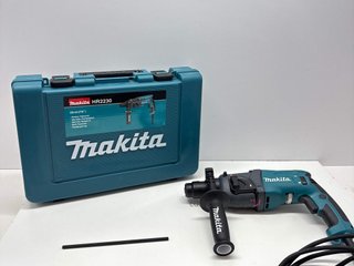 taladro electrico makita hr2230
