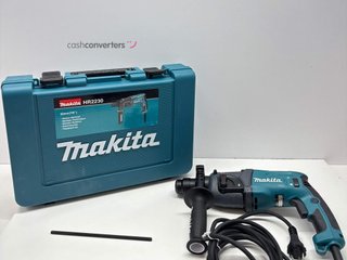 taladro electrico makita hr2230