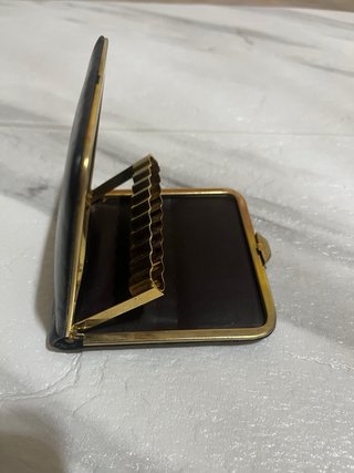 Cartera vintage cigarrillos piel negra y dorada