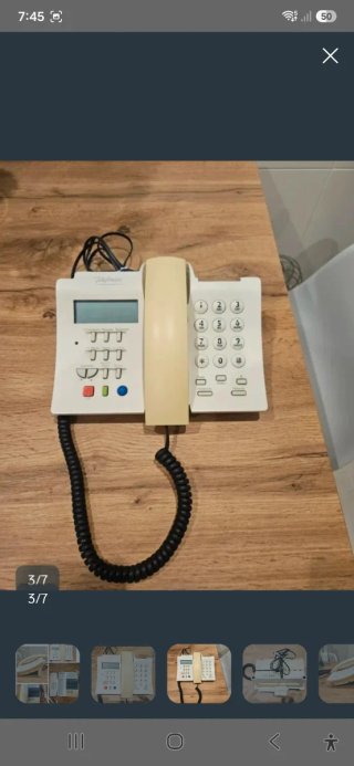 Teléfonos fijos vintage beige y blanco