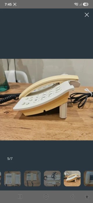 Teléfonos fijos vintage beige y blanco