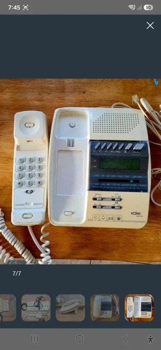 Teléfonos fijos vintage beige y blanco