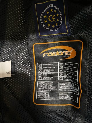 Mono de moto cuero negro y blanco
