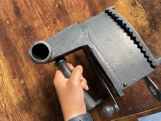 Plancha antigua de carbón con chimenea