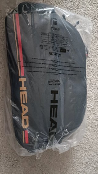 Paletero Head Negro con detalles rojos