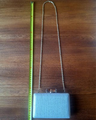 Mini Clutch rígido tejido con cierre estilo bambú