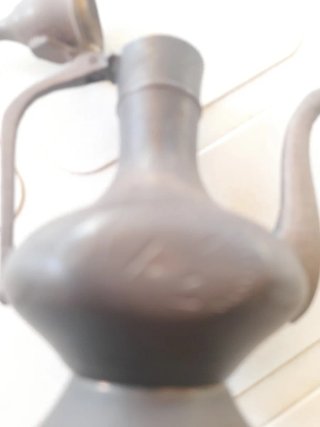 Aceitera antigua de metal india