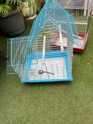 Jaula para pájaros azul y blanca Cada uno €10.
