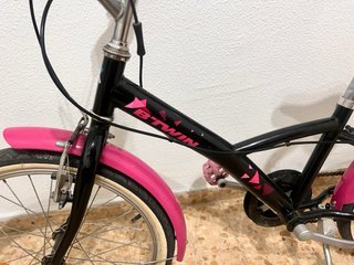 Bicicleta infantil rosa y negra