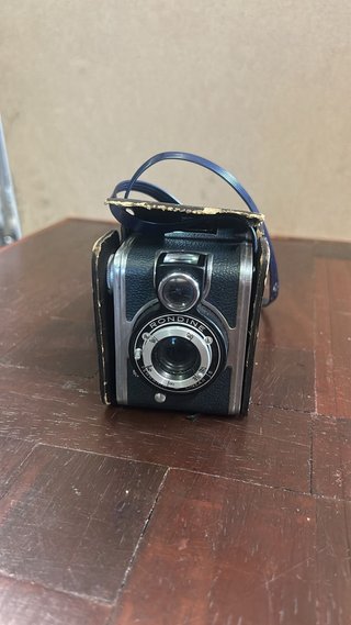 Macchina fotografica vintage nera e blu