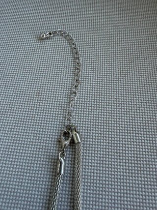 Collar con colgante de flor