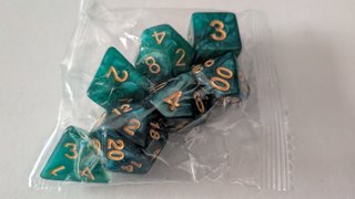 Set Dados D&D 7 Piezas Negro/Verde Precintados
