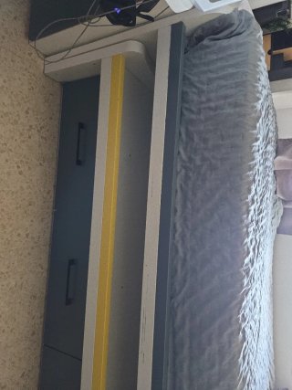 Cama nido gris y amarilla comprado en Merkamueble.