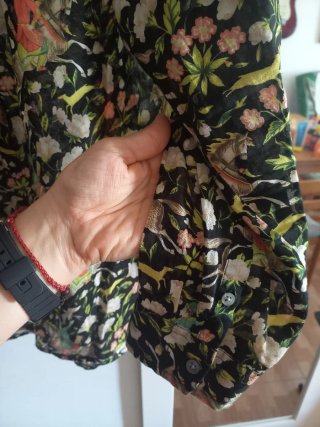 Blusa estampada manga larga