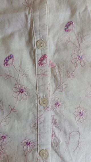 Blusa sin mangas con flores y lentejuelas