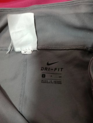 Mallas Nike grises con detalles de malla