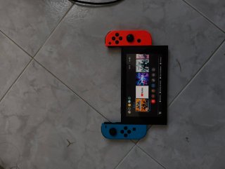 Nintendo Switch Blu/Rosso con controller rotto