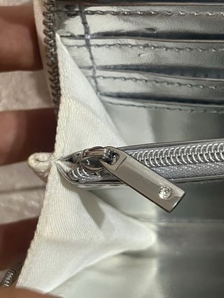 Cartera Swarovski plateada