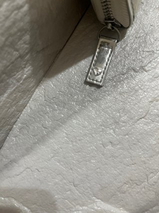 Cartera Swarovski plateada